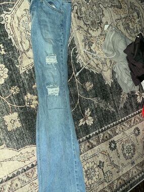 Women’s Light Blue Distressed Flared Jeans